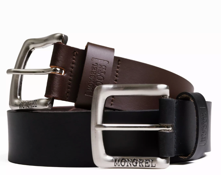 A pair of Mongrel leather belts, one in dark brown and one in black, both with silver-tone metal buckles. The brand name 'MONGREL' is embossed on the buckles and the leather keeper.