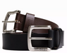 A pair of Mongrel leather belts, one in dark brown and one in black, both with silver-tone metal buckles. The brand name 'MONGREL' is embossed on the buckles and the leather keeper.